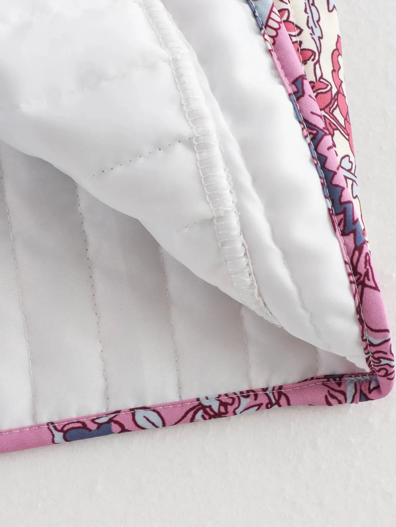 Sophie Paris I Gilet en coton matelassé avec motif brodé