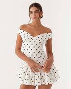 Robe mini sans manches Mesaro avec ourlet festonné