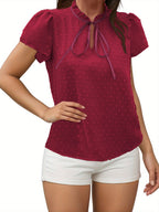 Vue arrière de la blouse femme à manches bouffantes unie
