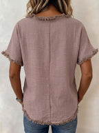 T-shirt femme ample uni à franges présenté en entier sur fond neutre