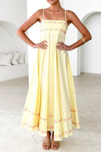 Robe longue à bretelles spaghetti brodée de fleurs