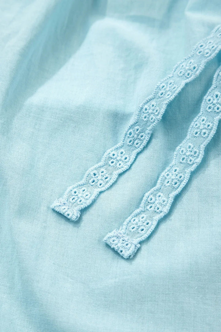 Blouse à manches bouffantes avec bordure en dentelle à œillets pour femmes