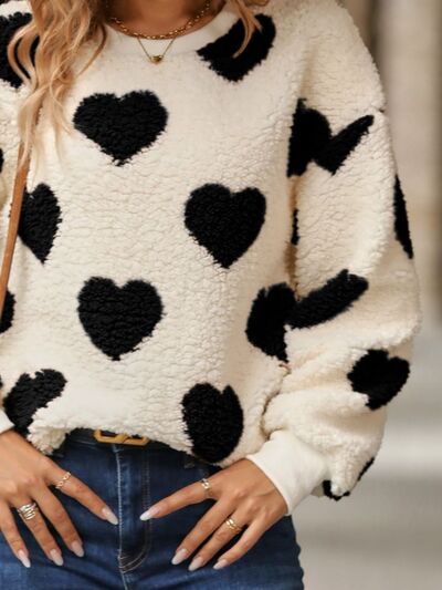 Pull-over tricoté motif cœur douillet