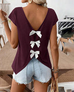 T-shirt femme uni porté, coupe décontractée et féminine