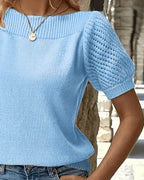 Détail des manches bouffantes courtes du pull femme uni