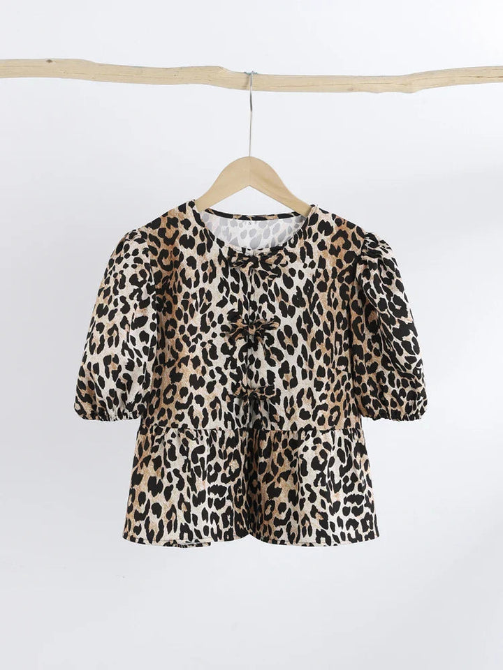 Blouse à manches bouffantes imprimé léopard avec détail nœud