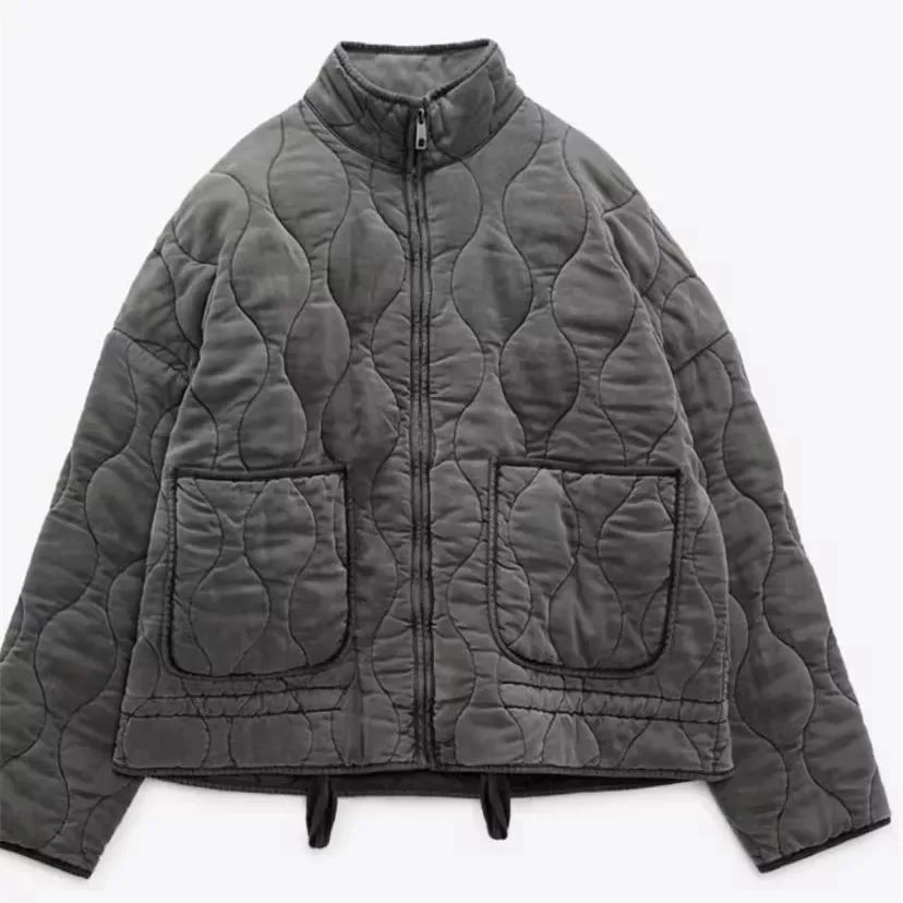 Veste matelassée vintage avec détails de couture classiques