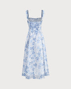 Robe mi-longue bleue à fleurs avec col carré froncé