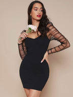 Robe ajustée en maille transparente froncée à manches gigot