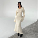Robe longue en maille nuage ivoire à dos ouvert