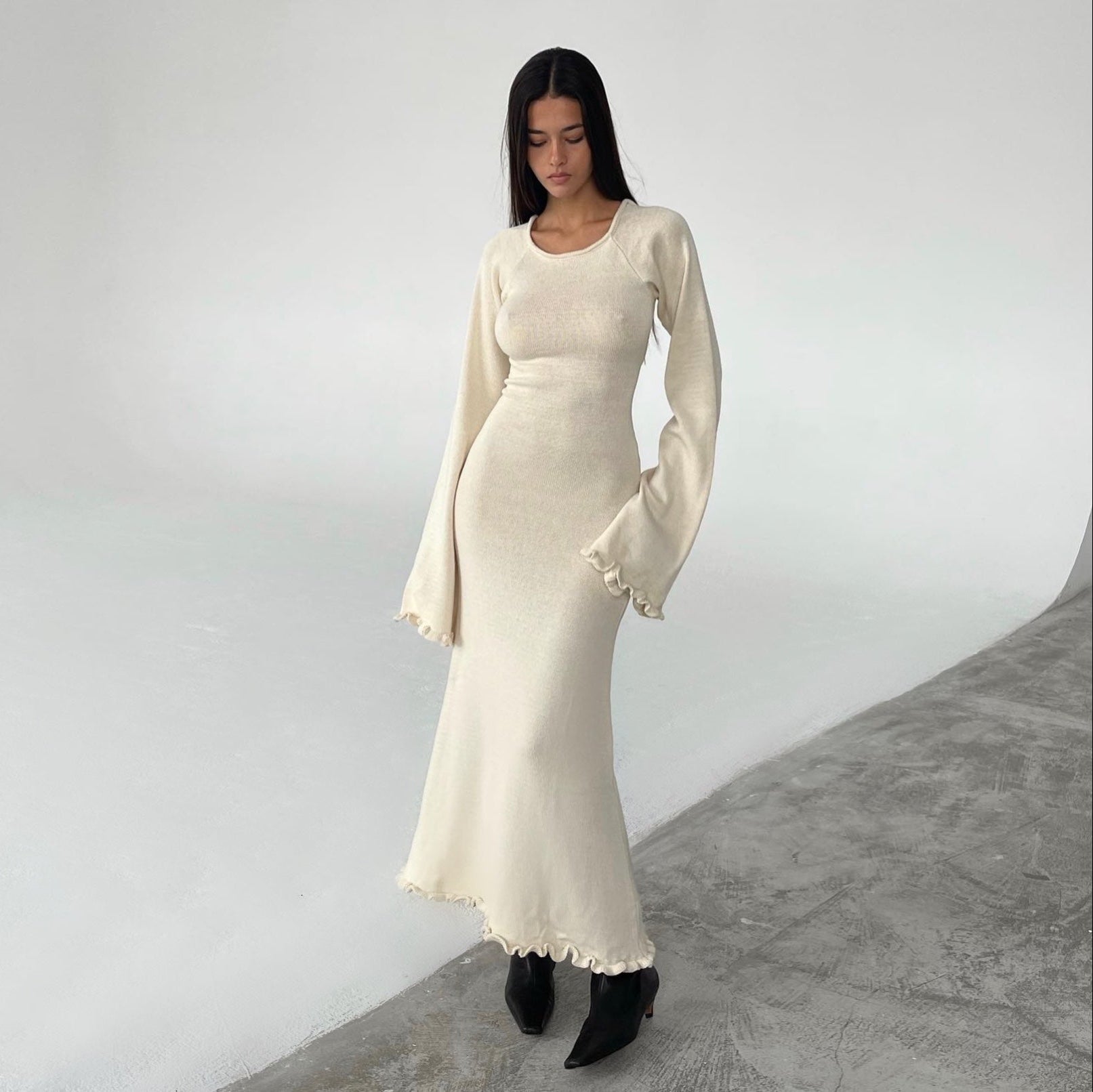 Robe longue en maille nuage ivoire à dos ouvert