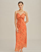Robe longue orange à fleurs avec silhouette trapèze et bretelles fines