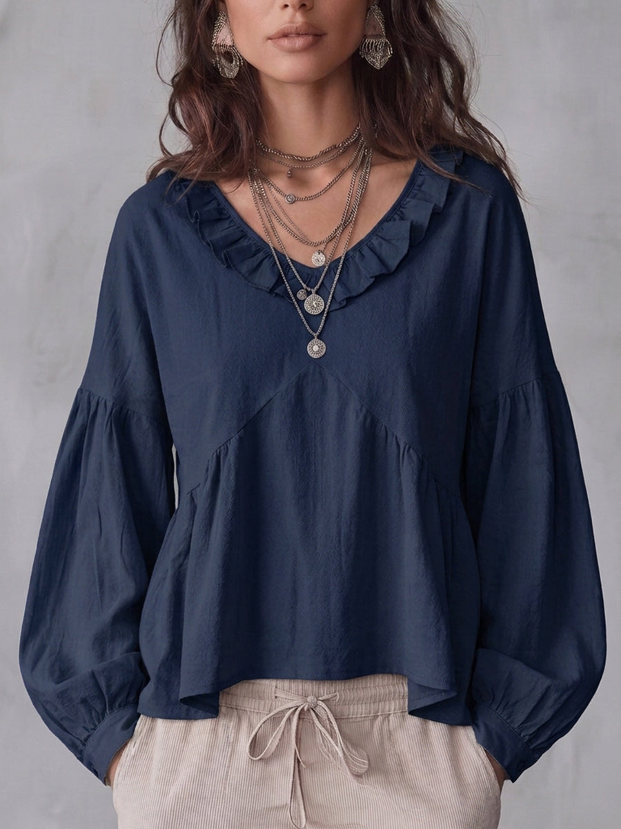Blouse femme à manches longues et coupe ample vue de trois quarts