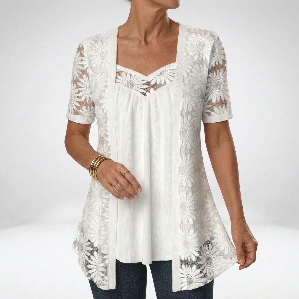 Blouse en dentelle avec broderie florale et encolure en cœur