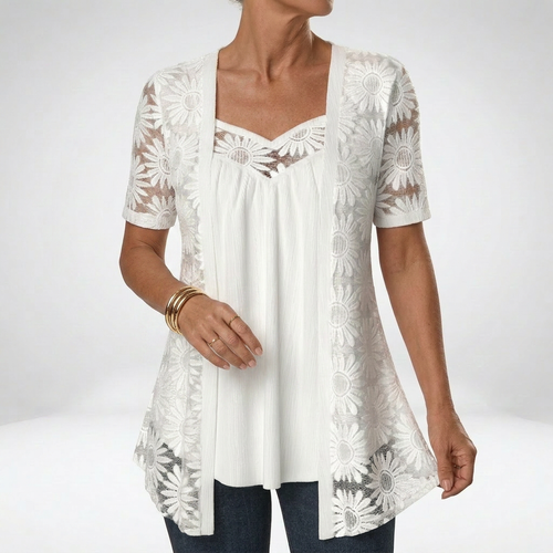 Blouse en dentelle avec broderie florale et encolure en cœur