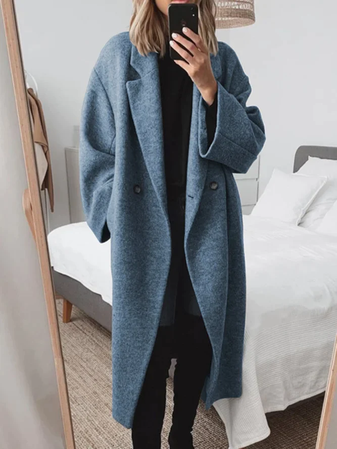 Manteau long élégant à double bouton et coupe ample