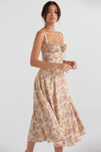 Robe moulante bustier à fleurs et taille découverte
