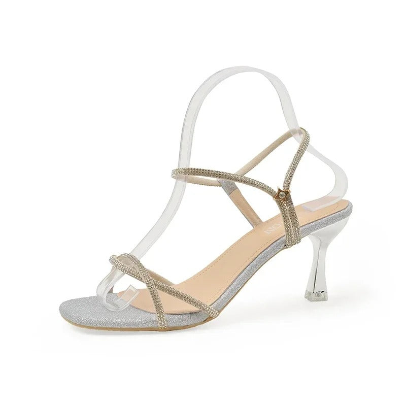 Isabelle Moreau® | Glitzernde Riemchensandalen mit Metallic-Absatz
