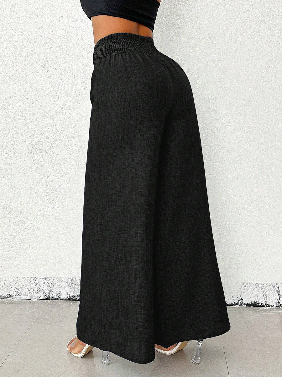 Pantalon large femme uni vue de dos