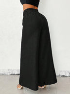 Pantalon large femme uni vue de dos