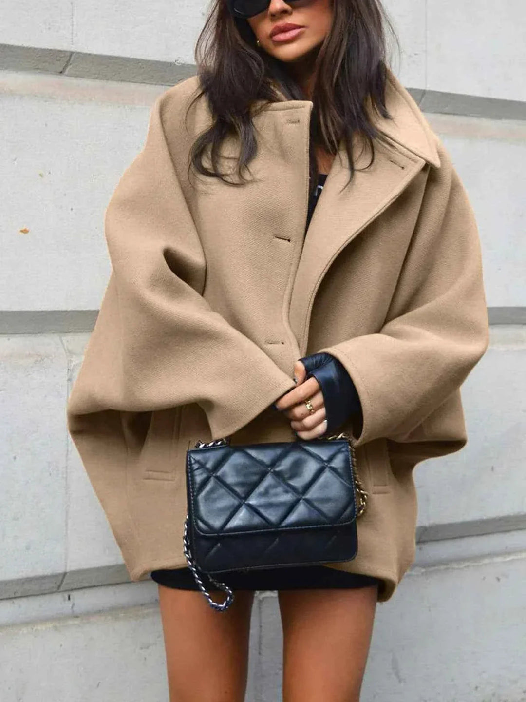 Manteau d'hiver oversize pour femme avec col à revers et boutons asymétriques