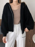Pull à capuche zippé en maille pour femmes