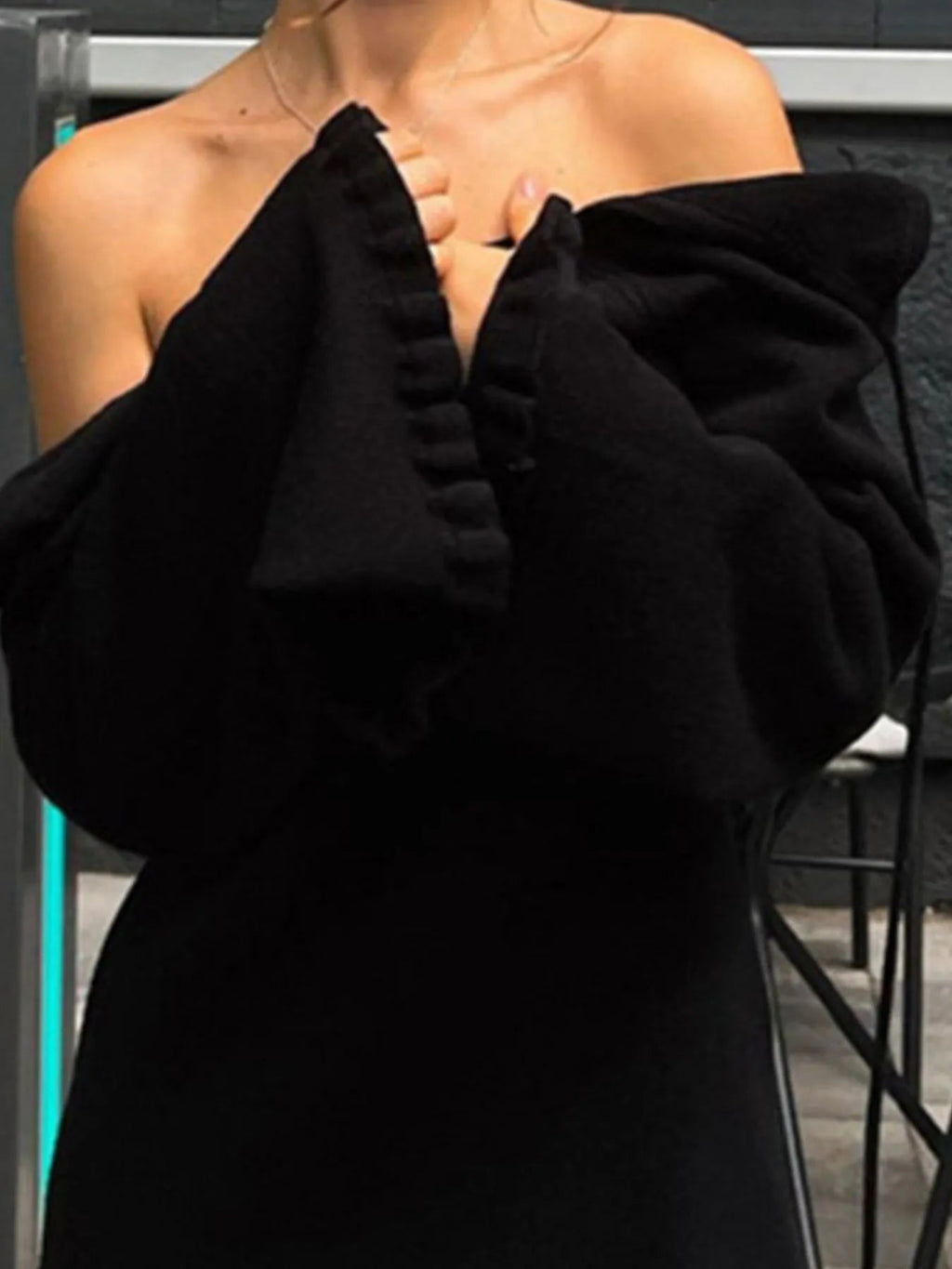 Robe pull en maille à manches longues et dos nu