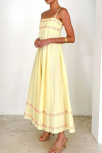 Robe longue à bretelles spaghetti brodée de fleurs