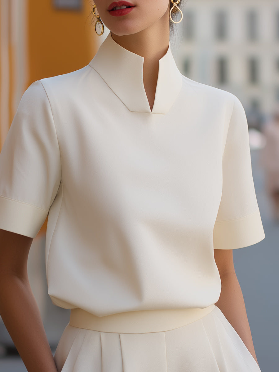 Blouse structurée minimaliste pour femmes à col montant