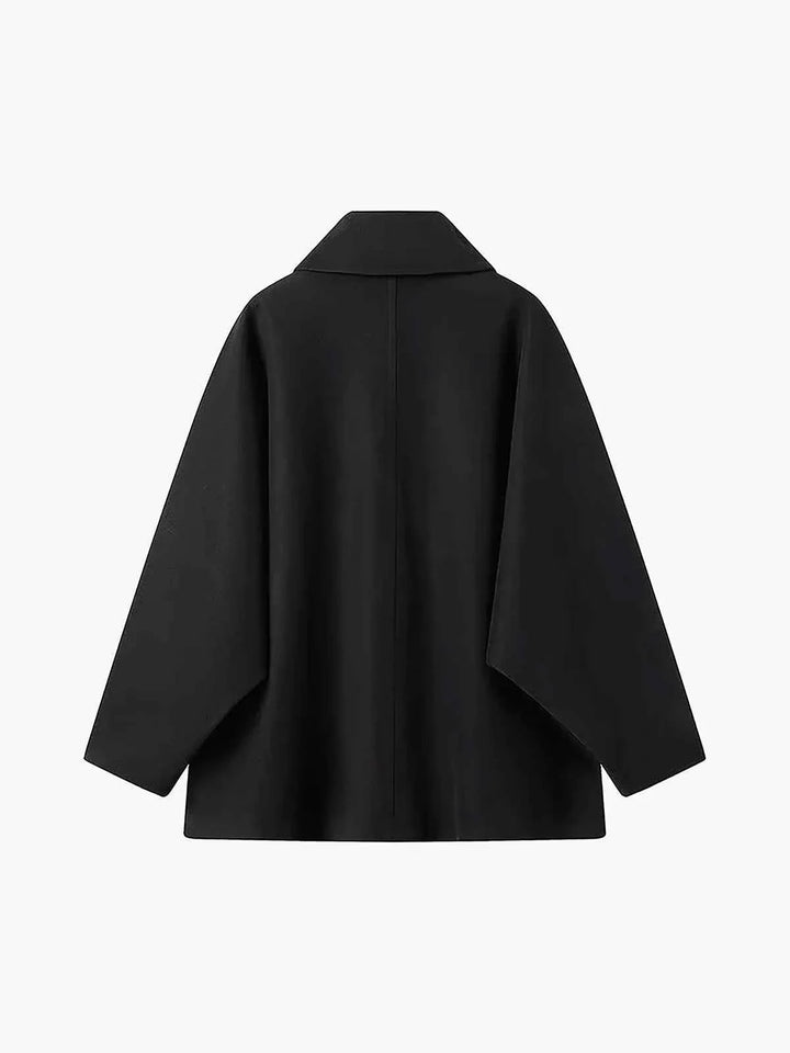 Manteau d'hiver oversize pour femme avec col à revers et boutons asymétriques