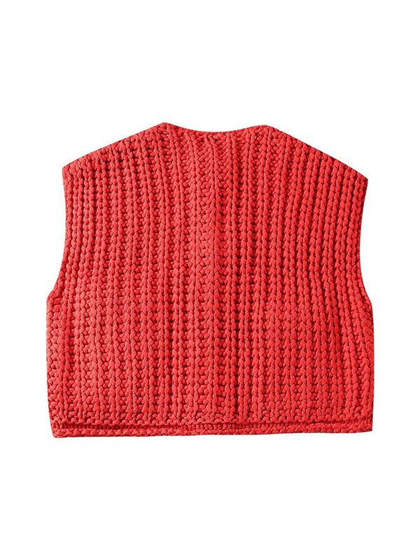 Texture de la maille unie du cardigan sans manches