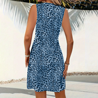Silhouette féminine portant une robe mini léopard pour l'été